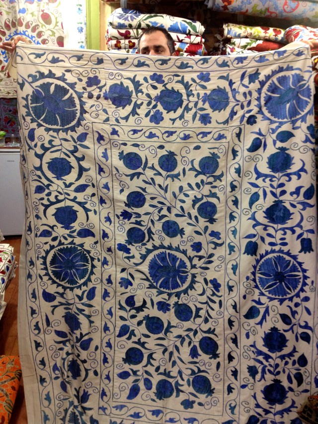 I wasn't looking for anything like this but ended up falling in love with this Suzani tapestry so I came home with it too!  Currently at the foot of our bed.