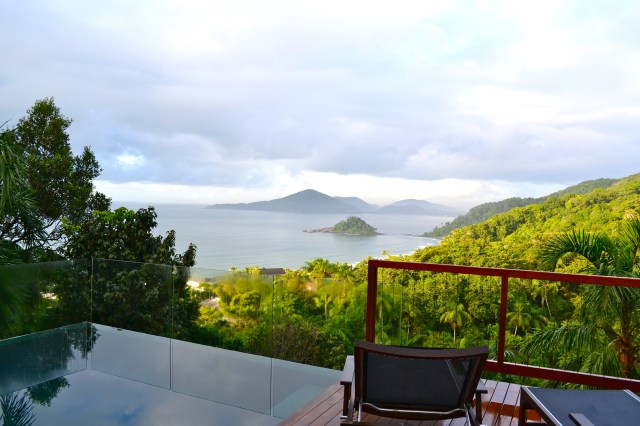 Infinity pool on the deck overlooking the jungle and the beach.
