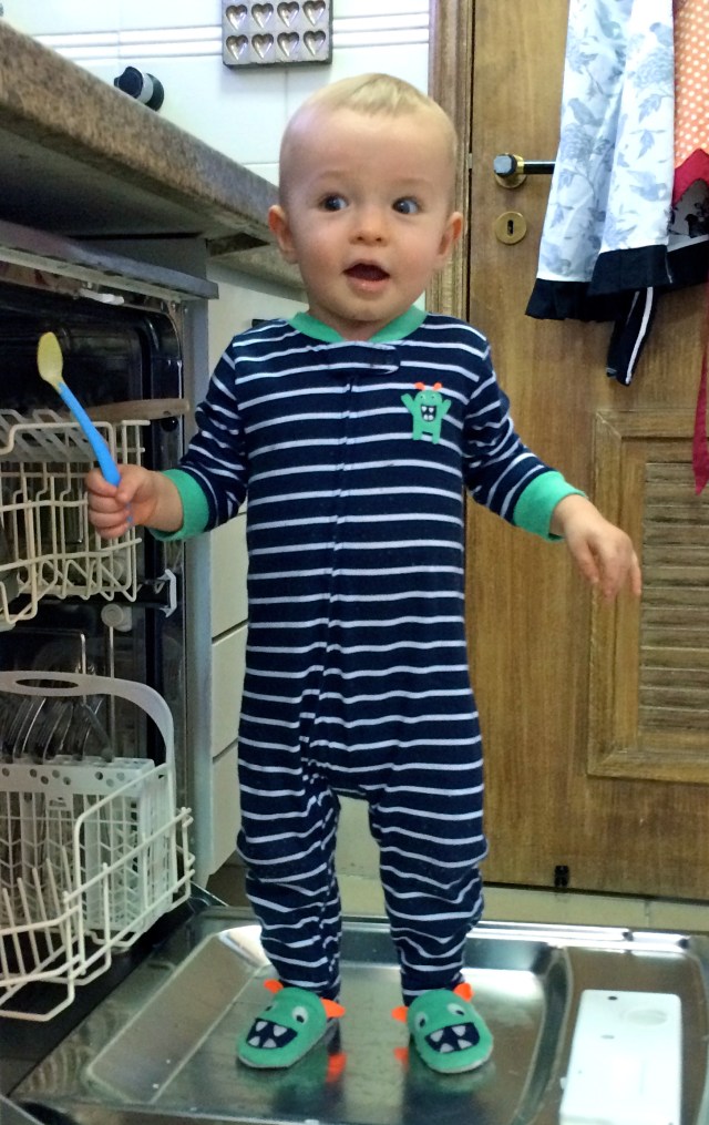 She even lets him play in the dishwasher!