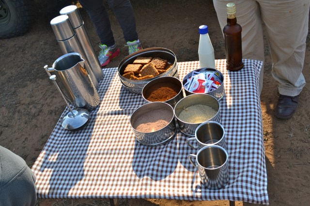 Sunrise set-up: coffee, tea and hot chocolate, homemade granola bars, and a little local Amarula for a morning kick in your coffee. 