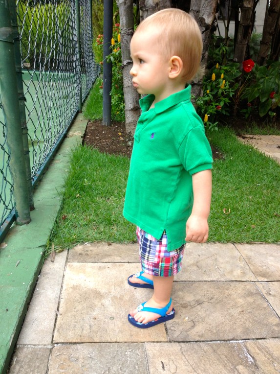 Mesmerized as he watches the big boys play soccer.