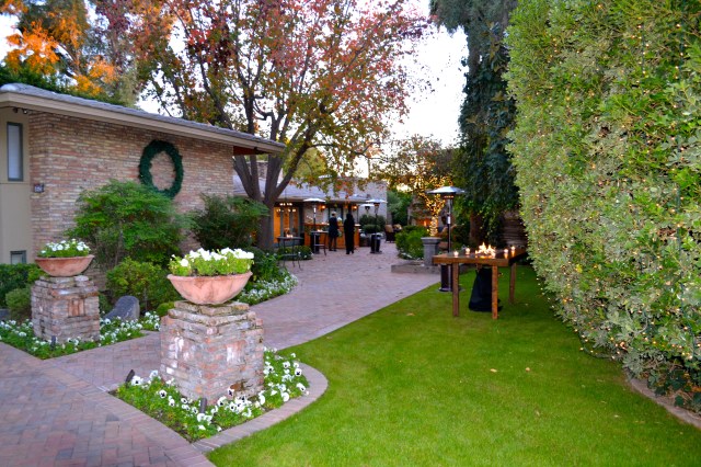 The view coming into the front yard. Tables lit and ready!