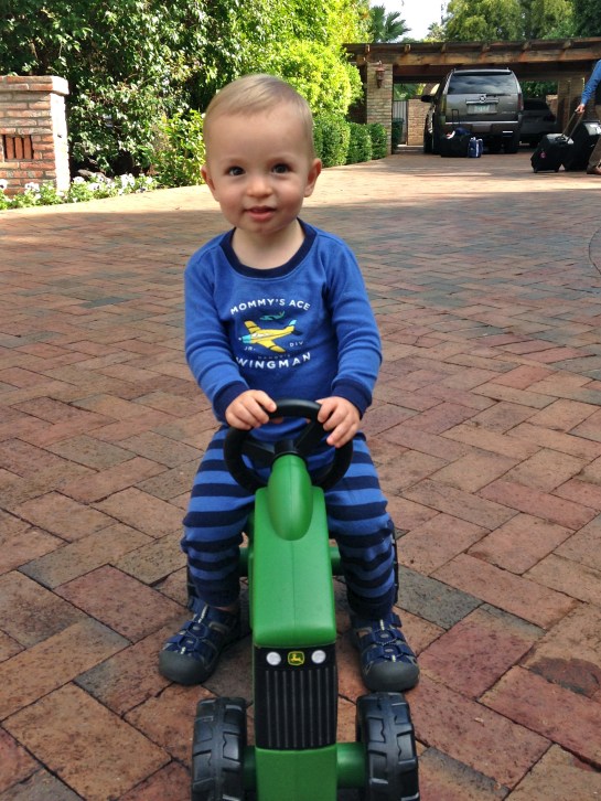 Colt riding his first tractor!
