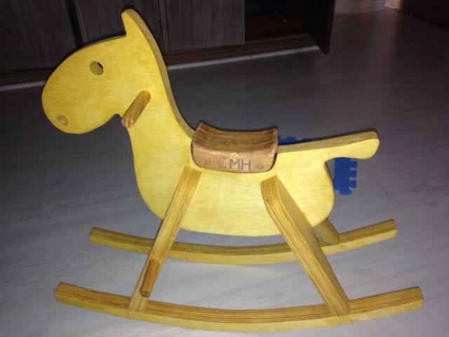 The "rocking colt" that Michael and Trent made Colt - finally finished! And Colt loves it!