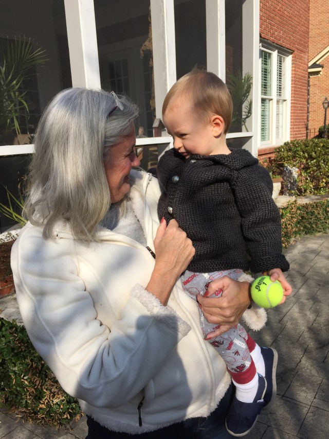 Very excited about the beautiful new sweater that Aunt Sheryl knit him.