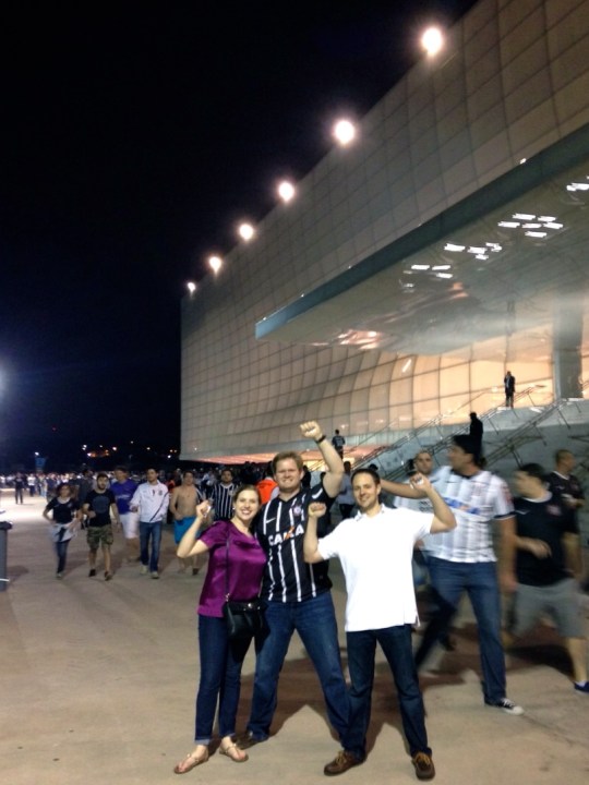 In front of the stadium.