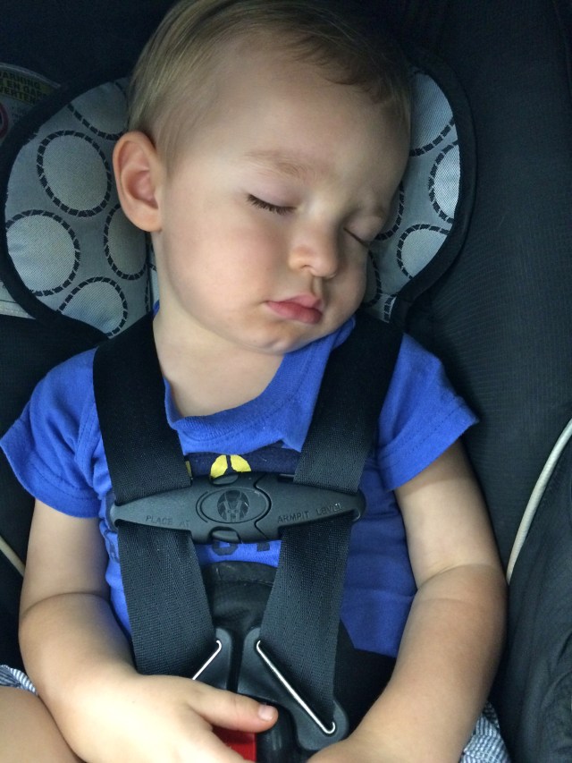 Passed out in the car seat.