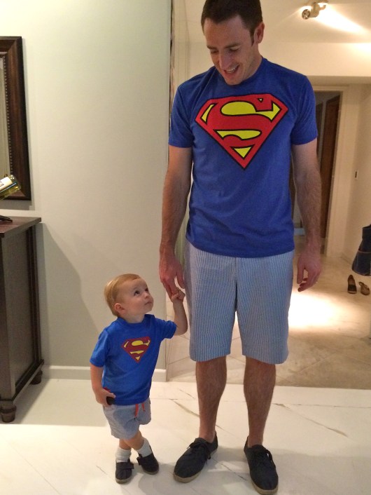 They love to dress alike. Especially when it's Superman!