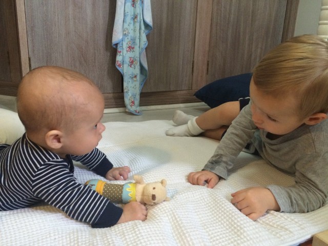 Colt helping me babysit Cooper - Brittany's little guy.