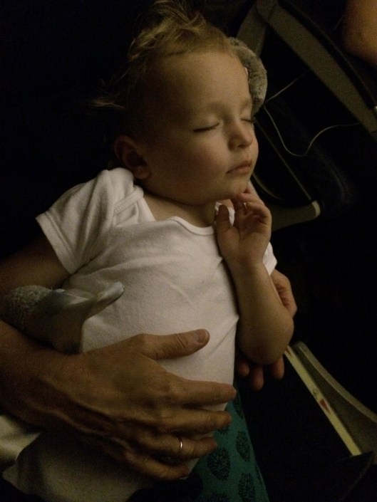 Sleeping in Gigi's arms on the flight to SC!