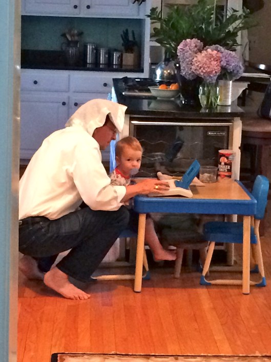 Colt and Pasha playing on the 25 year old  tot "computer." 