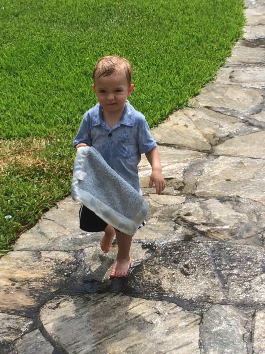 Taking blankie out to play in the rain!