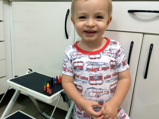 Colt so proud of lining up the crayons!