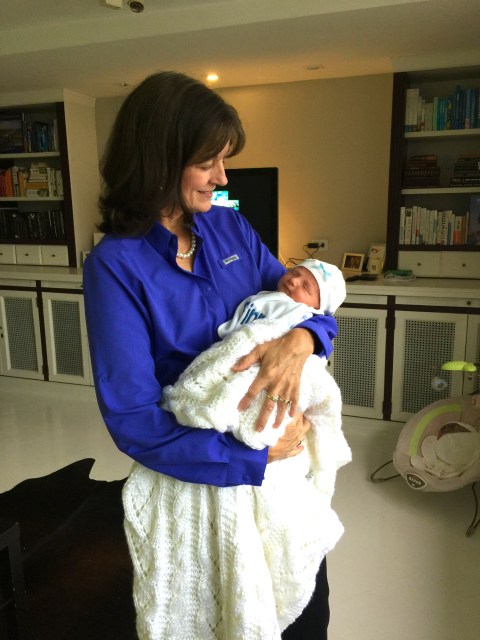 Gigi holding Finn in the beautiful blanket that Aunt Sheryl knitted for him!