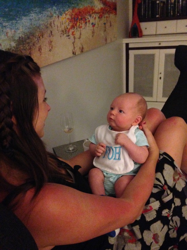 Finn getting some snuggles with his Godmother Paige.